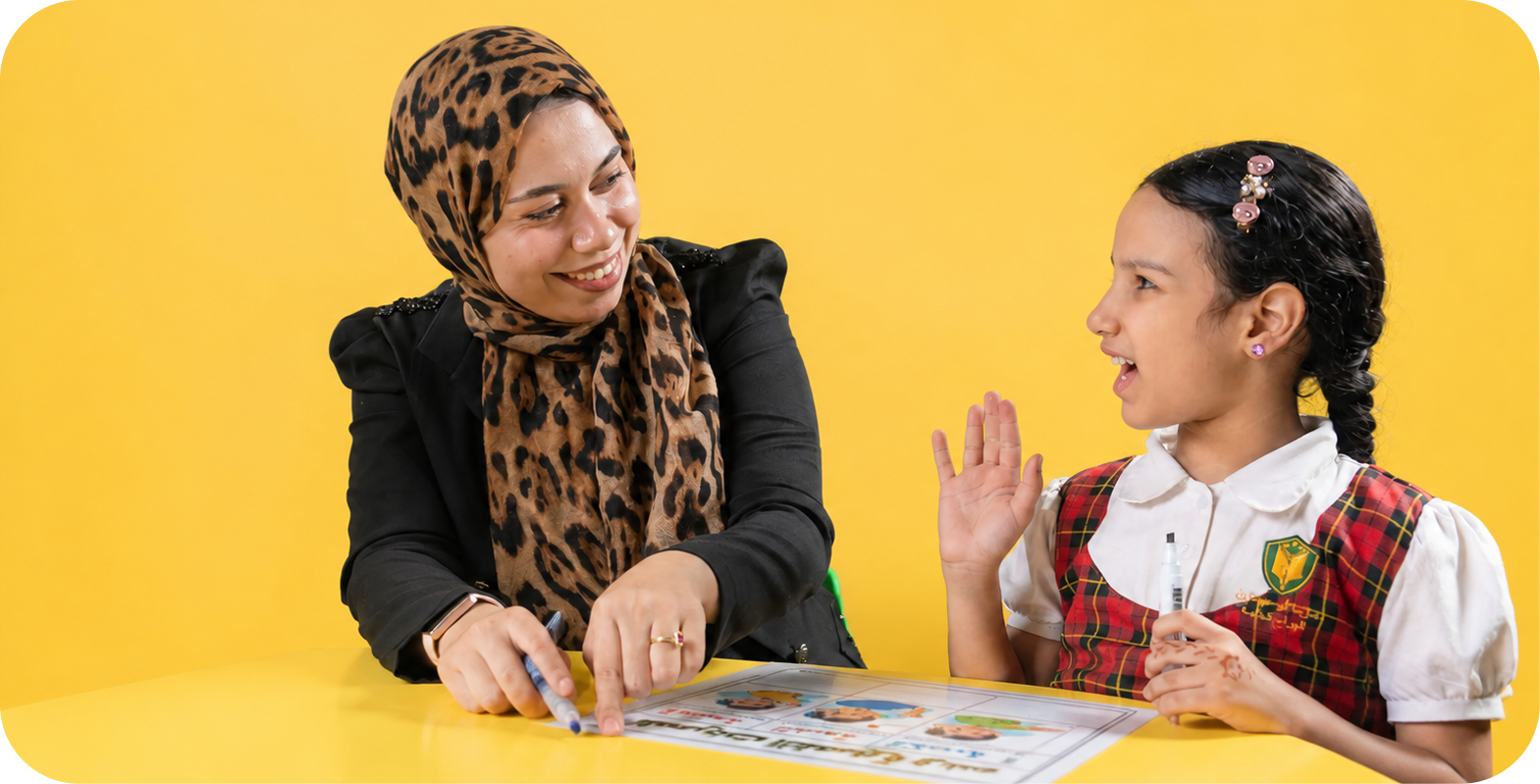 Teacher and student working together
